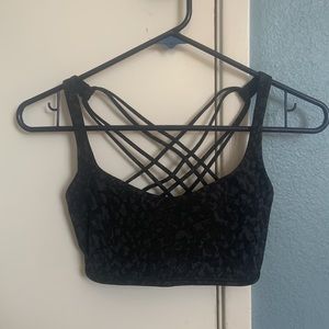 Lululemon black animal print bra. Never worn. Too small for me. Cute style.